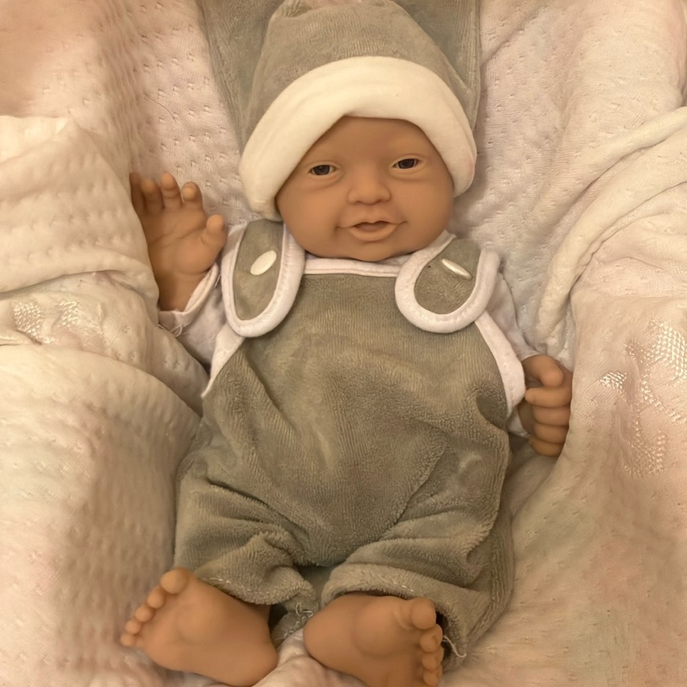 Adorable Baby Doll in Gray Outfit